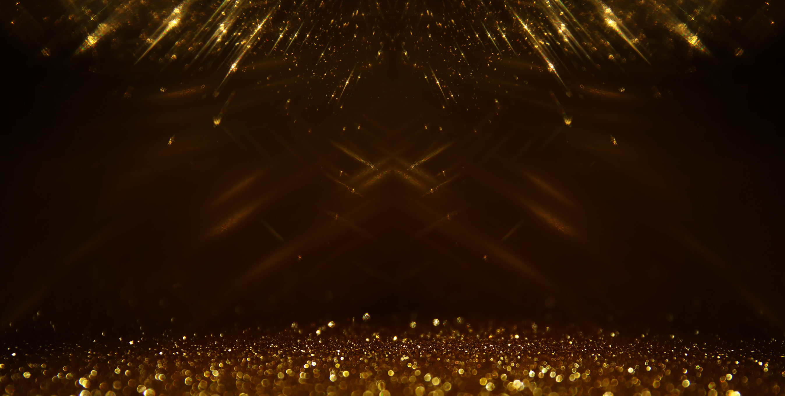background of abstract gold and black glitter lights. defocused